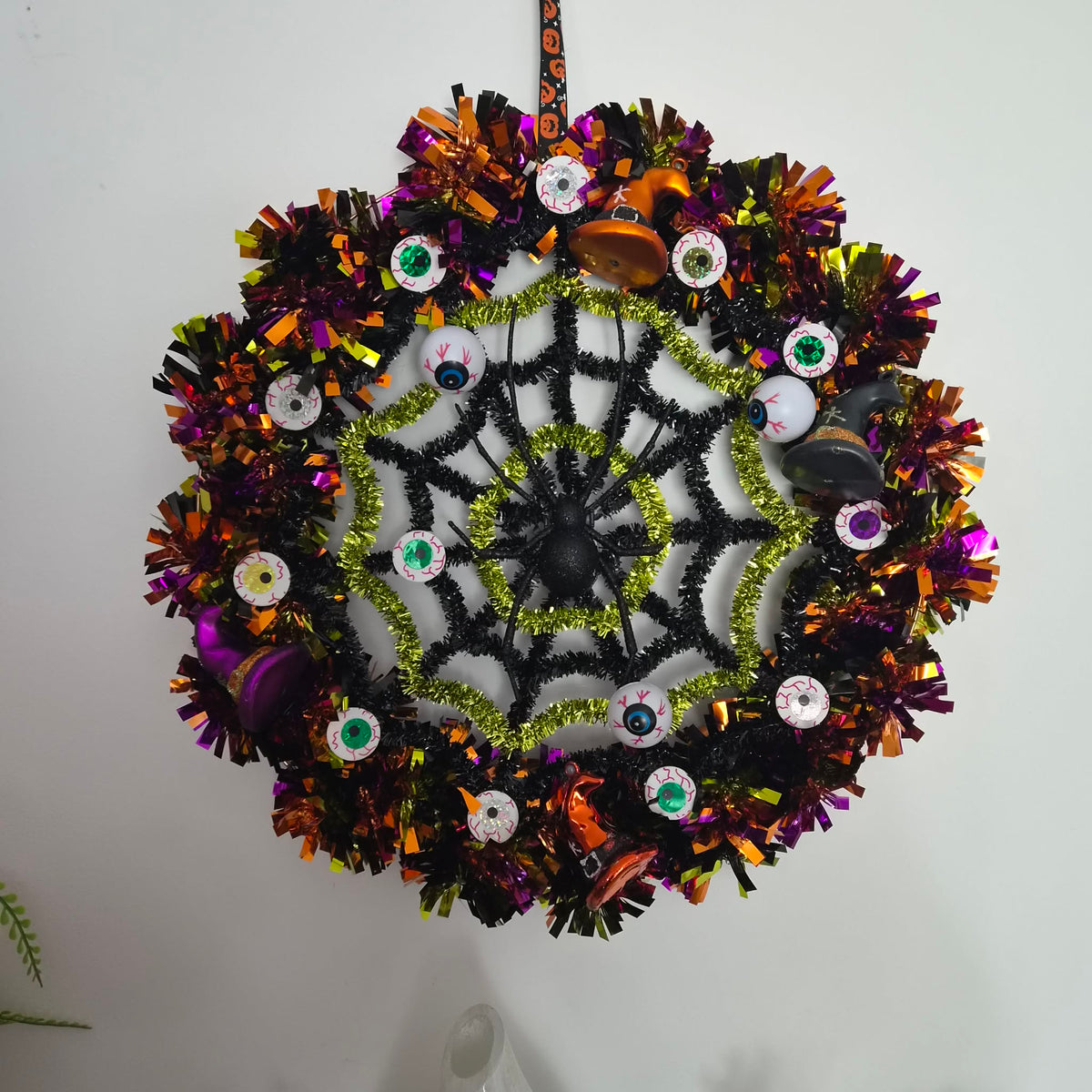 Handmade 16-Inch Halloween Tinsel Wreath – Witch Hats, Eyeballs & Spiderweb Door Decor