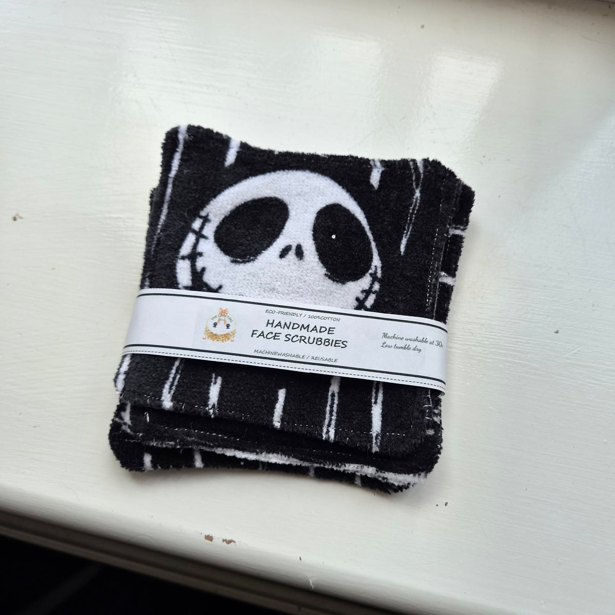 Handmade reusable Jack Skeleton face scrubbies